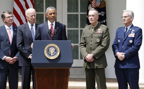 U.S. President Barack Obama, flanked by Defense Secretary Ash Carter (L) and Vice President Joe Biden (2nd L), introduces U.S. Marine Corps General Joseph Dunford (2nd R) as his nominee to be the next chairman of the Joint Chiefs of Staff, in the Rose Garden at the White House in Washington May 5, 2015. Also pictured is U.S. Air Force General Paul Selva (R), Obama's nominee to be vice chairman of the Joint Chiefs. REUTERS/Jonathan Ernst - GF10000084856