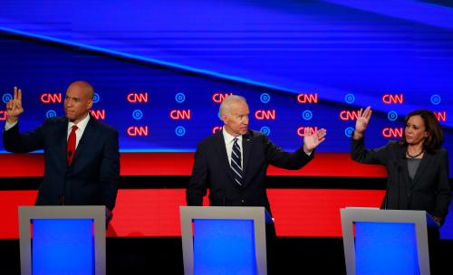 U.S. Senator Cory Booker (L), former Vice President Joe Biden and U.S. Senator Kamala Harris gesture on the second night of the second 2020 Democratic U.S. presidential debate in Detroit, Michigan, July 31, 2019. REUTERS/Lucas Jackson - HP1EF810595O8