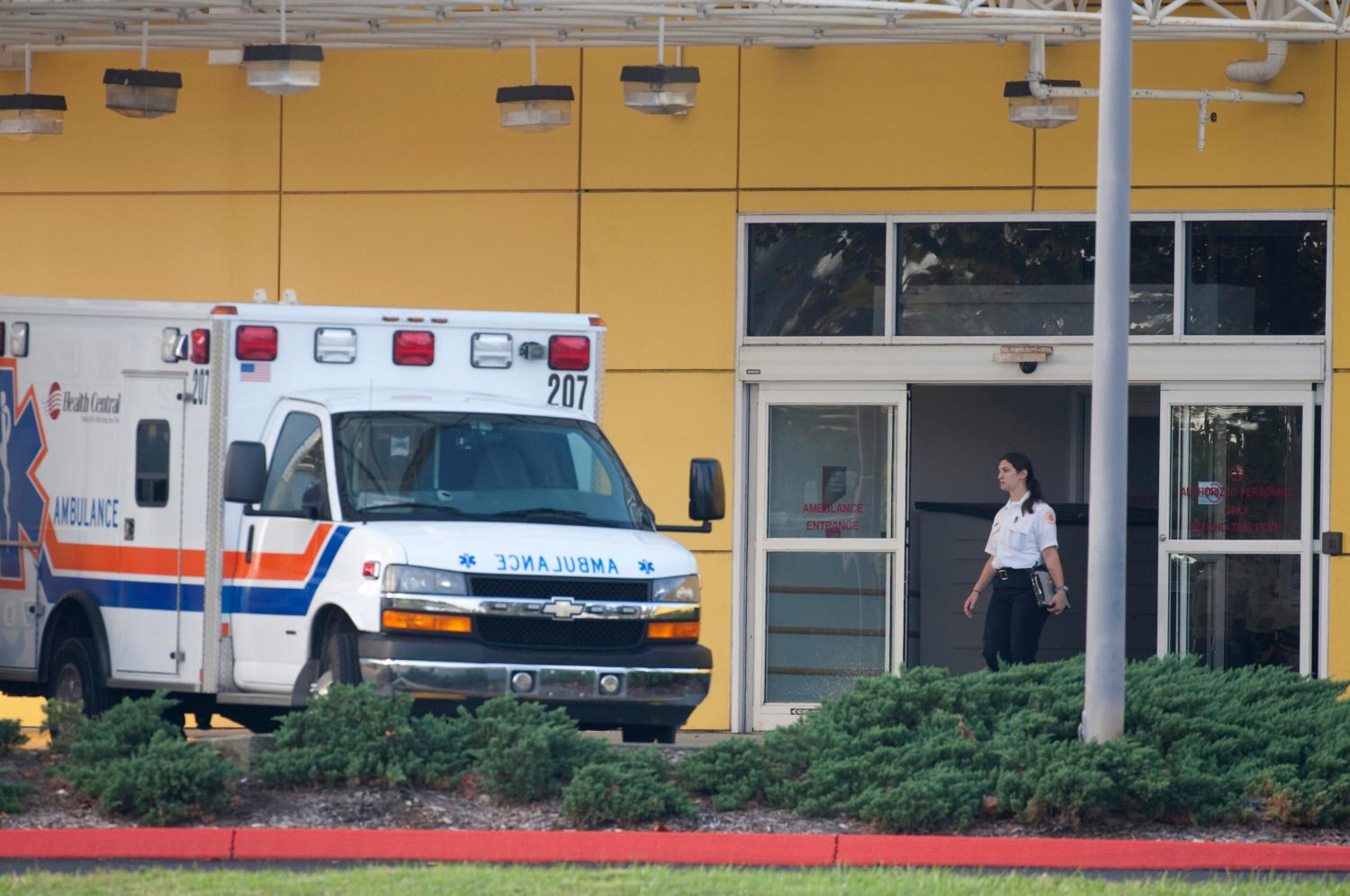 An ambulance sits outside the emergency room of Health Central Hospital in Occoee, Florida where an unidentified woman was brought from the home of PGA golfer Tiger Woods during the early morning hours December 8, 2009. REUTERS/Scott Audette  (UNITED STATES HEALTH SPORT GOLF IMAGES OF THE DAY) - GM1E5C81RL301