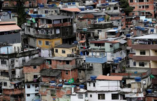 A view of Rocinha slum with a Brazilian national flags during the World Cup Group E soccer match between Brazil and Switzerland, in Rio de Janeiro, Brazil June 17, 2018. REUTERS/Bruno Kelly - RC123B277C30