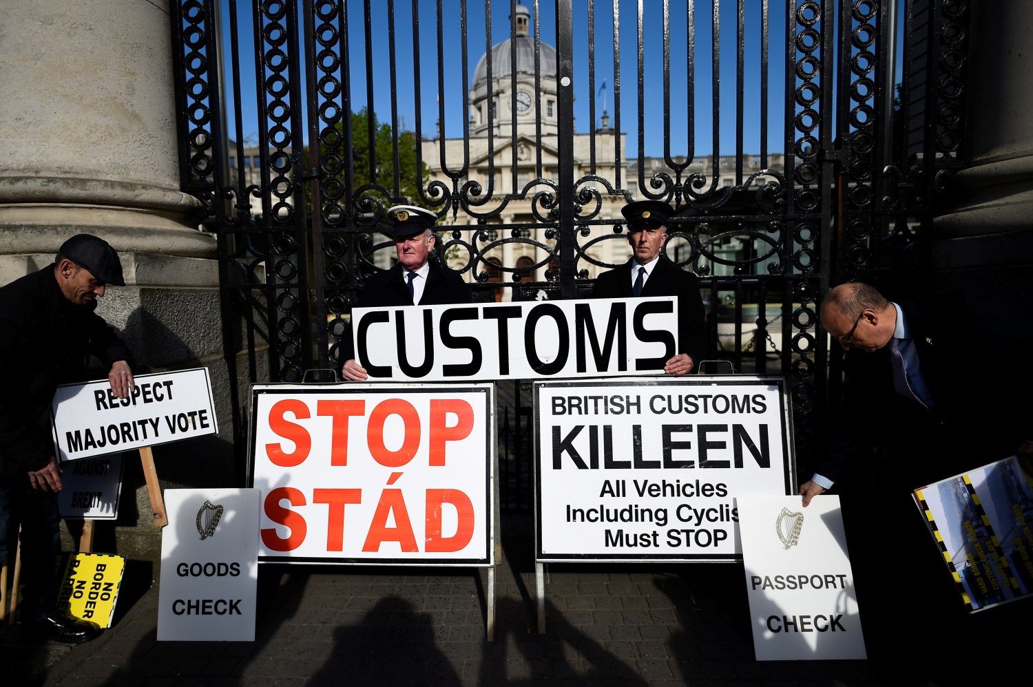 Anti-Brexit campaigners, Borders Against Brexit place placards in protest outside Irish Government buildings in Dublin, Ireland April 25, 2017. REUTERS/Clodagh Kilcoyne - RC14D205A310