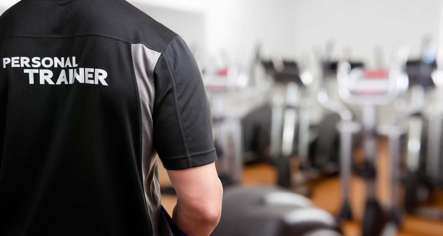 Personal trainer in gym
