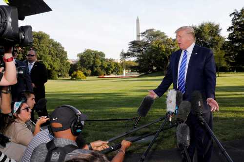 U.S. President Donald Trump speaks with reporters on the South Lawn of the White House in Washington, U.S., before his departure to Camp David, August 30, 2019. REUTERS/Yuri Gripas - RC1574057F20