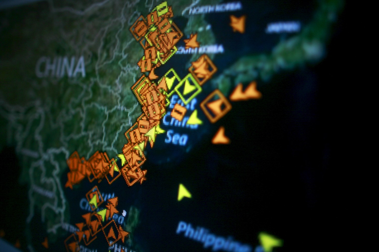 An interactive map shows ship movements around China, seen on a Reuters Eikon screen, October 23, 2015. About 4 million barrels of crude oil bought by a Chinese state trader for the country's strategic reserves have been stranded in two tankers off an eastern port for nearly two months due to a lack of storage, two trade sources said. Picture taken October 23, 2015.  REUTERS/Thomas White - GF20000029024