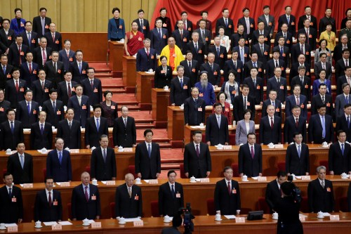 Chinese President Xi Jinping and other officials stand for the national anthem at the opening session of the Chinese People's Political Consultative Conference (CPPCC) at the Great Hall of the People in Beijing, China March 3, 2019. REUTERS/Jason Lee - RC112F033650