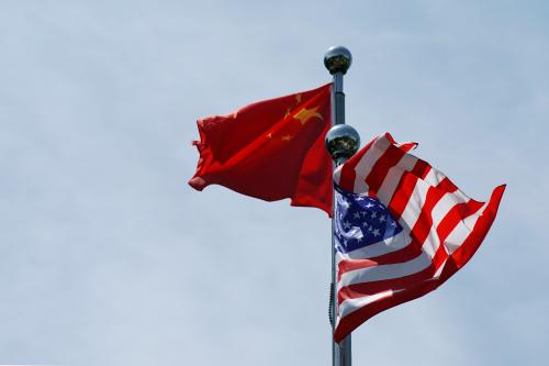 Chinese and U.S. flags flutter near The Bund, before U.S. trade delegation meet their Chinese counterparts for talks in Shanghai, China July 30, 2019.  REUTERS/Aly Song - RC1460EC2500