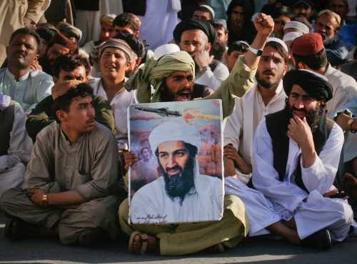 Supporters of al-Qaeda leader Osama bin Laden shout anti-American slogans, after the news of his death, during a rally in Quetta May 2, 2011. Bin Laden was killed in a U.S. helicopter raid on a mansion near the Pakistani capital Islamabad early on Monday, officials said, ending a nearly 10-year worldwide hunt for the mastermind of the Sept. 11 attacks. U.S. officials said bin Laden was found in the million-dollar compound in the military garrison town of Abbottabad, 60 km (35 miles) north of Islamabad.   REUTERS/Naseer Ahmed  (PAKISTAN - Tags: CIVIL UNREST CRIME LAW IMAGES OF THE DAY) - GM1E75300AX01