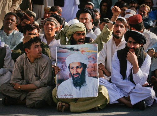 Supporters of al-Qaeda leader Osama bin Laden shout anti-American slogans, after the news of his death, during a rally in Quetta May 2, 2011. Bin Laden was killed in a U.S. helicopter raid on a mansion near the Pakistani capital Islamabad early on Monday, officials said, ending a nearly 10-year worldwide hunt for the mastermind of the Sept. 11 attacks. U.S. officials said bin Laden was found in the million-dollar compound in the military garrison town of Abbottabad, 60 km (35 miles) north of Islamabad.   REUTERS/Naseer Ahmed  (PAKISTAN - Tags: CIVIL UNREST CRIME LAW IMAGES OF THE DAY) - GM1E75300AX01