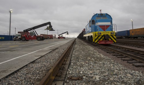 Railways and a container yard are seen at the Khorgos border crossing point, east of the country's biggest city and commercial hub Almaty, Kazakhstan, October 19, 2015. Kazakhstan wants to establish itself as a major trading hub between China and Europe and get a share of a $600 billion market, but it will have to end tough, often time-wasting, regulations that hurt its reputation as a cross-border trading partner. Picture taken October 19, 2015.  REUTERS/Shamil Zhumatov - GF20000033627