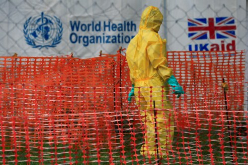 A person dressed in ebola protective apparel is seen inside an ebola care facility at the Bwera general hospital near the border with the Democratic Republic of Congo in Bwera, Uganda, June 14, 2019. REUTERS/James Akena? - RC11E436E5B0