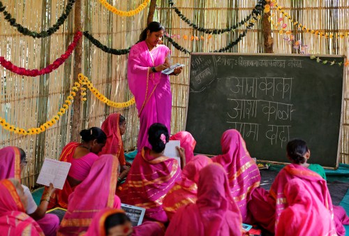 Sheetal Prakash More (R), a 30-year-old teacher, teaches at Aajibaichi Shaala (Grandmothers' School) in Fangane village, India, February 15, 2017. REUTERS/Danish Siddiqui            SEARCH "AAJIBAICHI" FOR THIS STORY. SEARCH "WIDER IMAGE" FOR ALL STORIES. - RC1D60A88720