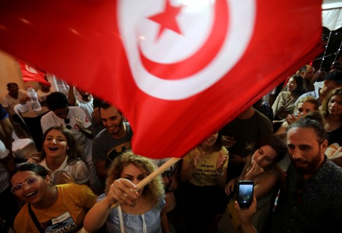 Supporters of detained presidential candidate and Tunisian media mogul Nabil Karoui react after unofficial results of the Tunisian presidential election in Tunis, Tunisia, September 15, 2019. REUTERS/Muhammad Hamed - RC173E0E8170