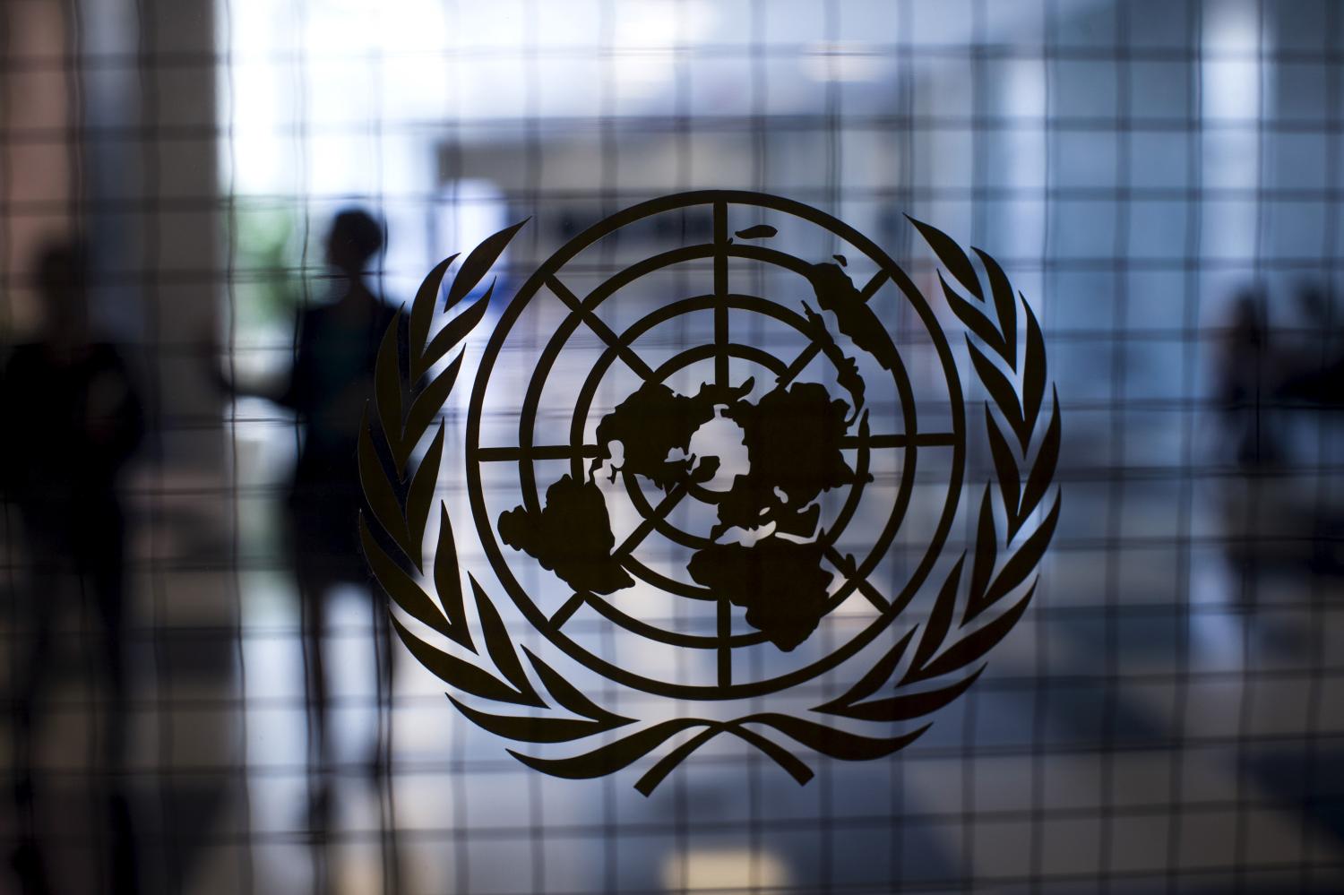 A United Nations logo is seen on a glass door in the Assembly Building at the United Nations headquarters in New York City September 18, 2015. As leaders from almost 200 nations gather for the annual general assembly at the United Nations, the world body created 70 years ago, Reuters photographer Mike Segar documented quieter moments at the famed 18-acre headquarters on Manhattan's East Side. The U.N., established as the successor to the failed League of Nations after World War Two to prevent a similar conflict from occurring again, attracts more than a million visitors every year to its iconic New York site. The marathon of speeches and meetings this year will address issues from the migrant crisis in Europe to climate change and the fight against terrorism. REUTERS/Mike SegarPICTURE 13 OF 30 FOR WIDER IMAGE STORY "INSIDE THE UNITED NATIONS HEADQUARTERS"SEARCH "INSIDE UN" FOR ALL IMAGES  - GF10000219225