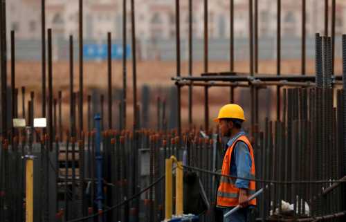 A Chinese construction labourer works at the site of the future Iconic Tower skyscraper, at its foundations in the business district, being built by China State Construction Engineering Corp (CSCEC) in the New Administrative Capital (NAC) east of Cairo, Egypt May 2, 2019. Picture taken May 2, 2019. REUTERS/Amr Abdallah Dalsh - RC143E9C90F0