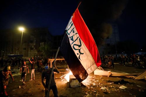 Demonstrators gather at a protest during a curfew, two days after the nationwide anti-government protests turned violent, in Baghdad, Iraq October 3, 2019. REUTERS/Thaier Al-Sudani - RC1AEB580EE0