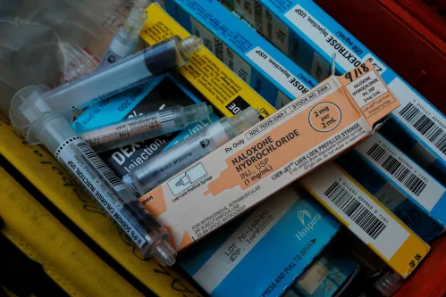 Used Narcan (naloxone hydrochloride) containers and syringes sit in a case, after paramedics revived a man in his 40's, who was found unresponsive, after overdosing on opioids in Salem, Massachusetts, U.S., August 9, 2017. Picture taken August 9, 2017. REUTERS/Brian Snyder - RC19B9CD7CC0