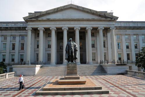 A man walks away from the U.S Treasury Department in Washington, U.S., August 6, 2018.     REUTERS/Brian Snyder - RC1FD03EA500