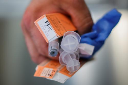 A Cataldo Ambulance medic holds used doses of naloxone after medics revived a man in his 40's who was found unresponsive from an opioid overdose in the Boston suburb of Salem, Massachusetts, U.S., August 9, 2017. The victim received a total of 12mg of naloxone. Nurses at the hospital recognised the man, saying he was brought in the day before after overdosing. REUTERS/Brian Snyder  SEARCH "SNYDER OPIOIDS" FOR THIS STORY. SEARCH "WIDER IMAGE" FOR ALL STORIES. - RC18689E2910