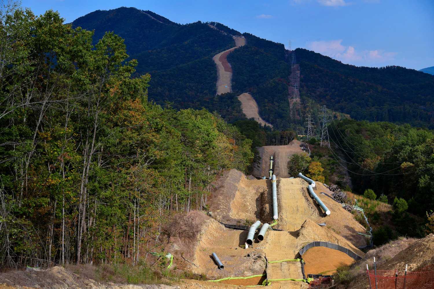 Lengths of pipe wait to be laid in the ground along the under-construction Mountain Valley Pipeline near Elliston, Virginia, U.S. September 29, 2019. Picture taken September 29, 2019. REUTERS/Charles Mostoller - RC12B8679450