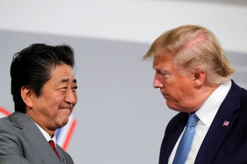 U.S. President Donald Trump and Japan's Prime Minister Shinzo Abe hold a bilateral meeting during the G7 summit in Biarritz, France, August 25, 2019. REUTERS/Carlos Barria - RC1B90DB2B30