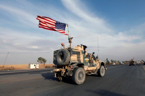 A convoy of U.S. vehicles is seen after withdrawing from northern Syria, in Erbil, Iraq October 21, 2019. REUTERS/Azad Lashkari - RC1AB61E8440