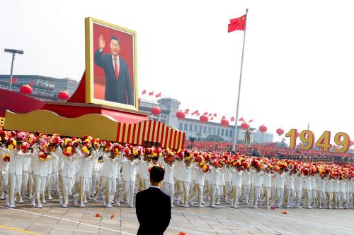 REFILE - REMOVING EXTRANEOUS WORD A float carrying a portrait of Chinese President Xi Jinping moves through Tiananmen Square during the parade marking the 70th founding anniversary of People's Republic of China, on its National Day in Beijing, China October 1, 2019. REUTERS/Thomas Peter - RC15CA56C990