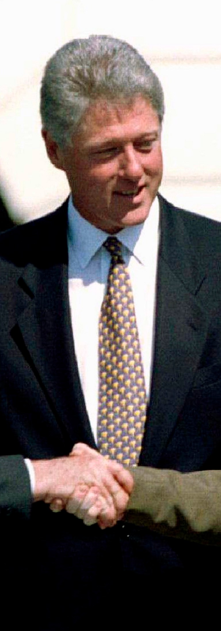U.S. President Bill Clinton (C) looks on as Israeli Prime Minister Yitzhak Rabin (L) and Palestine Liberation Organization (PLO) leader Yasser Arafat shake hands after the signing of the Israeli-PLO peace accord at the White House in this September 13, 1993 file photo. REUTERS/Gary Hershorn/Files (UNITED STATES - Tags: POLITICS TPX IMAGES OF THE DAY)ATTENTION EDITORS - THIS PICTURE IS PART OF PACKAGE '30 YEARS OF REUTERS PICTURES'TO FIND ALL 56 IMAGES SEARCH '30 YEARS' - LM2EB2A0WTA01