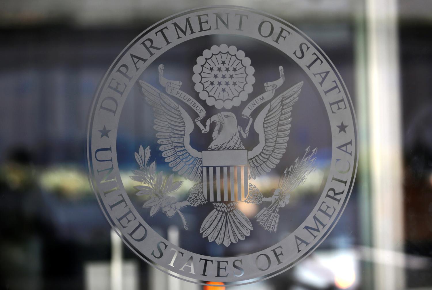 The seal of the United States Department of State is seen in Washington, U.S., January 26, 2017.      REUTERS/Joshua Roberts - RC1DC84D5960