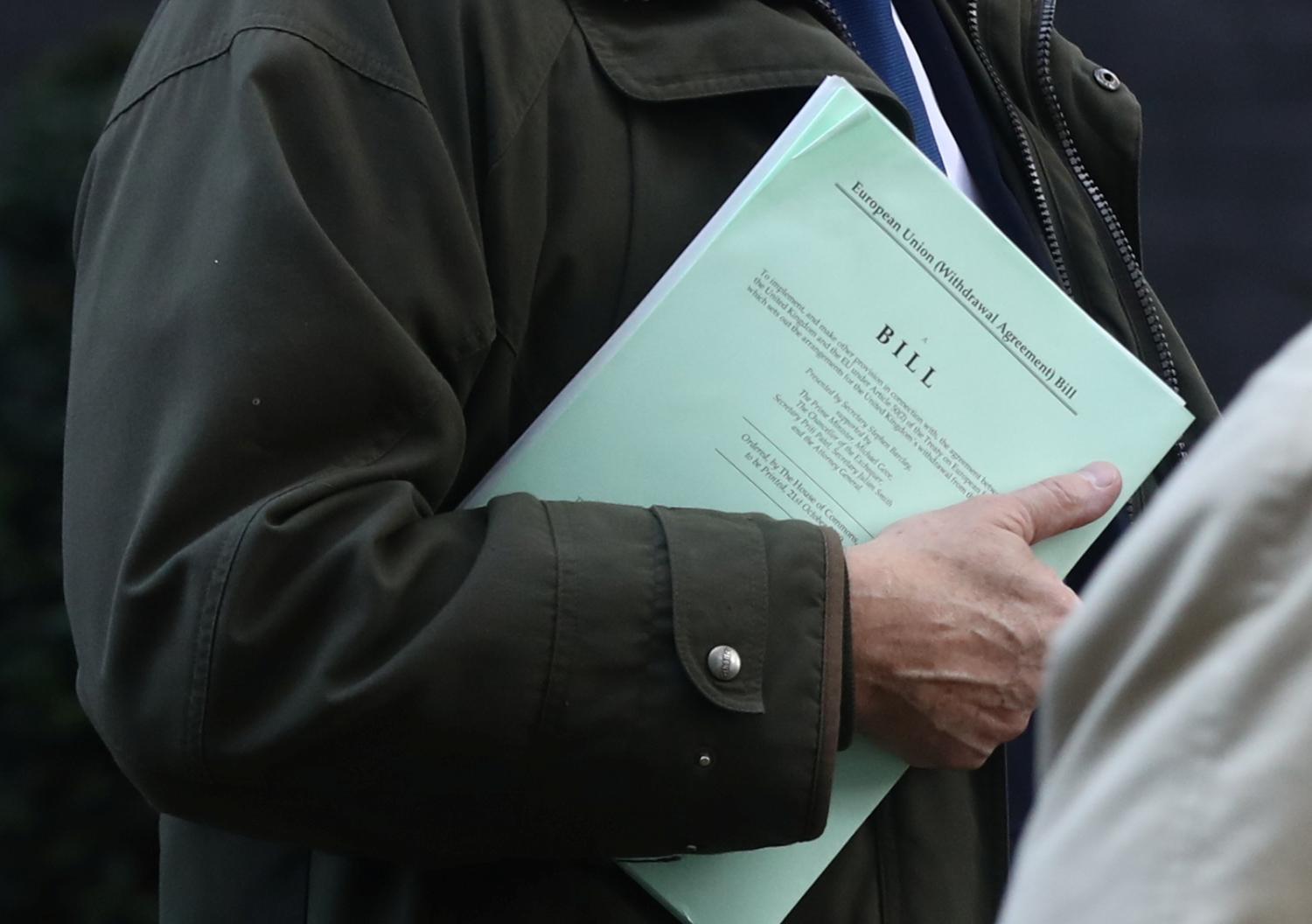 Britain's Conservative MP Iain Duncan Smith holds European Union Withgrawal Agreement Bill as he leaves Downing Street in London, Britain October 22, 2019. REUTERS/Simon Dawson - RC1CD7557D30