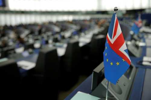 An hybrid flag depicting the EU and the British flags is seen during a debate on the last EU summit and Brexit at the European Parliament in Strasbourg, France, October 22, 2019. REUTERS/Vincent Kessler - RC11B41DA370