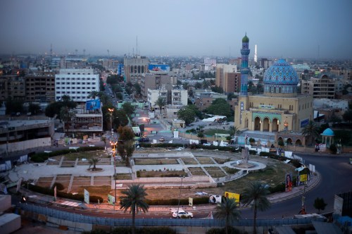 A general view of Firdos Square, one of the main squares of Baghdad April 29, 2014. Iraq is now gripped by its worst violence since the heights of its 2005-2008 sectarian war, and Sunni Islamist insurgents who target Shi'ites have been regaining ground in the country over the past year. But despite the instability, daily life continues in poor Shi'ite neighbourhoods of Baghdad such as Al-Fdhiliya and Sadr City - a sprawling slum marred by poor infrastructure and overcrowding. Reuters photographer Ahmed Jadallah spent time documenting the community and their daily life. Picture taken April 29, 2014. REUTERS/Ahmed Jadallah (IRAQ - Tags: CIVIL UNREST SOCIETY POLITICS)ATTENTION EDITORS: PICTURE 01 OF 32 FOR PACKAGE 'SOCCER, SALONS AND SWIMMING IN SADR CITY'. TO FIND ALL IMAGES SEARCH 'SADR JADALLAH' - GM1EA5T16KX01