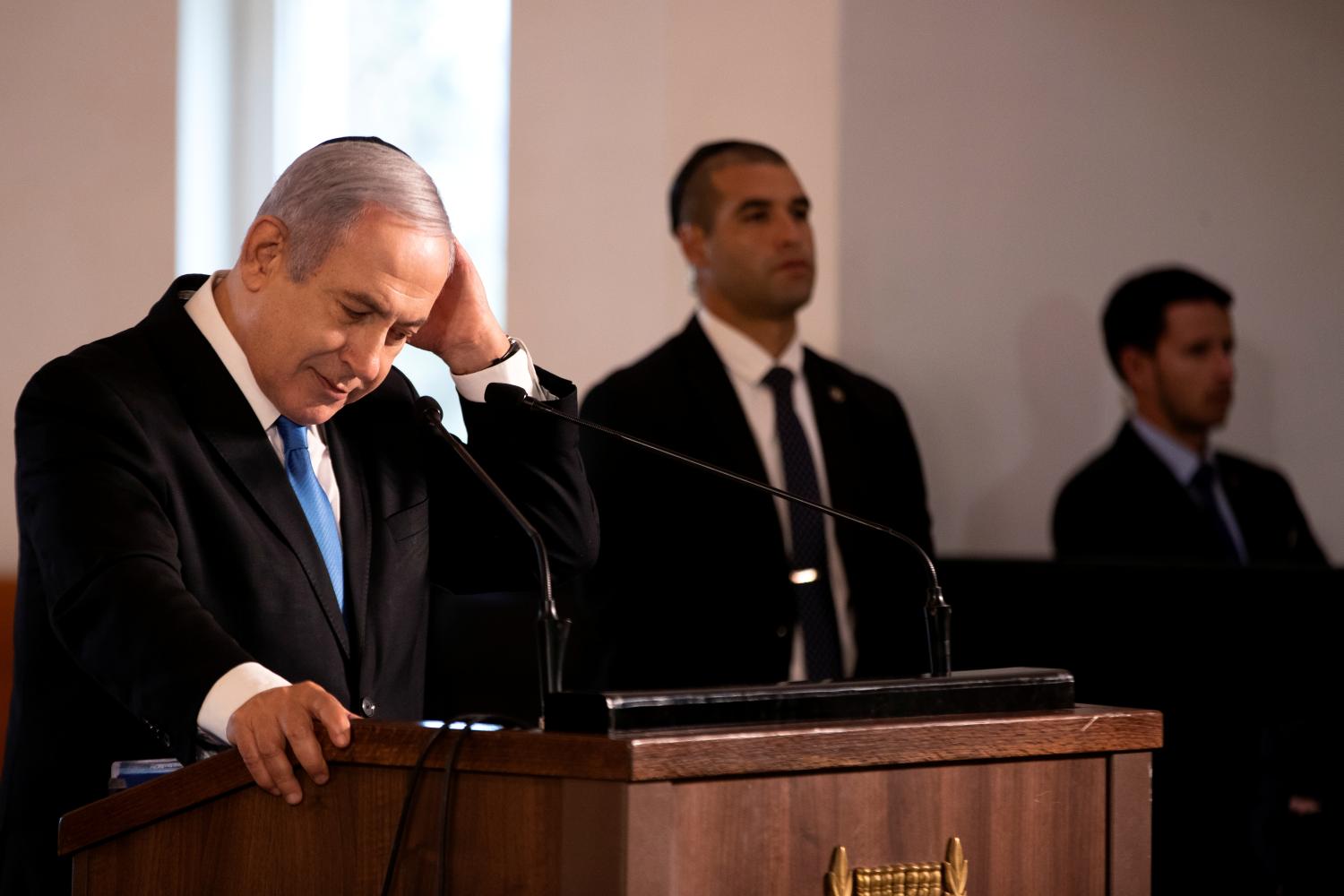 Israeli Prime Minister Benjamin Netanyahu speaks during a memorial ceremony held at the supreme court honouring former Supreme Court president Meir Shamgar who died on Saturday in Jerusalem October 22, 2019. REUTERS/Ronen Zvulun - RC11B6ED8B50