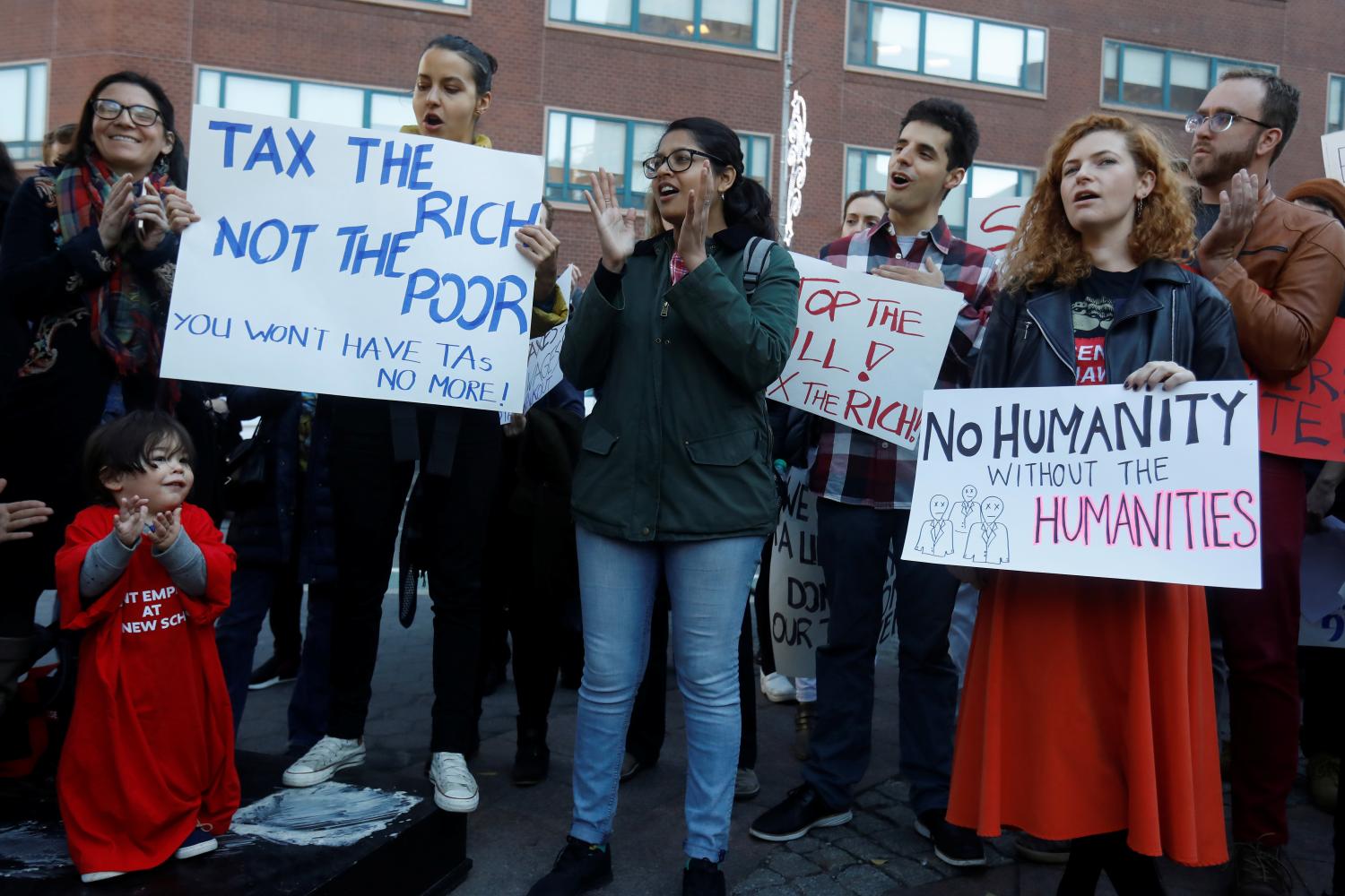Graduate students and others rally against the proposed GOP tax reform bill at Union Square in the Manhattan borough of New York City, New York, U.S., November 29, 2017. REUTERS/Shannon Stapleton - RC1BAA1EABA0
