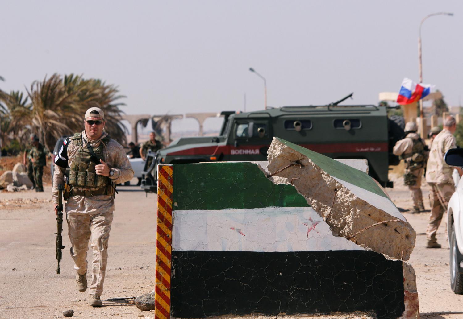 Russian forces are seen in the Nasib border crossing with Jordan in Deraa, Syria July 7, 2018. REUTERS/ Omar Sanadiki - RC164766C1C0