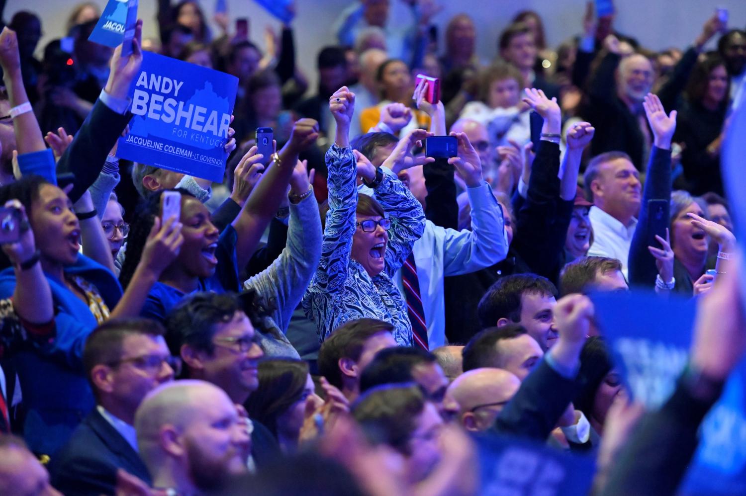 Supporters react to election results during the watch party for Kentucky's Attorney General Andy Beshear, running for governor against Republican incumbent Matt Bevin, in Louisville, Kentucky, U.S. November 5, 2019. REUTERS/Harrison McClary - RC2G5D95SWRE