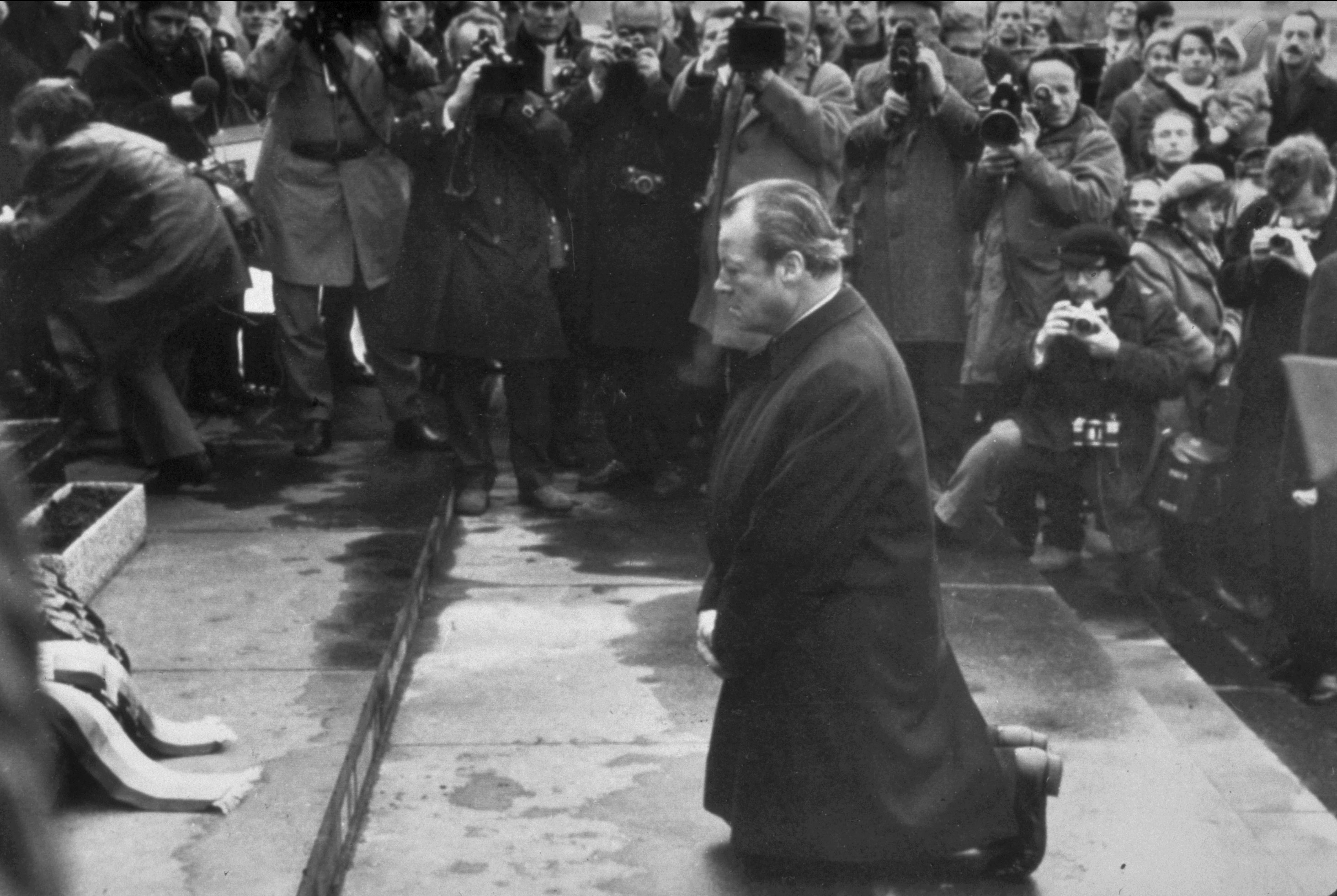 West German Chancellor Willy Brandt kneels in the Warsaw Ghetto, December 7, 1970. (Associated Press)