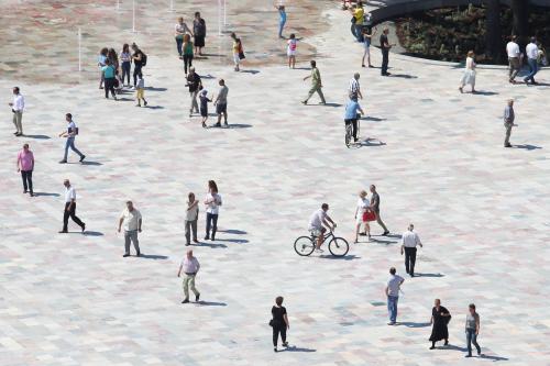 People walk on newly transformed Skenderbeg square in Tirana, Albania June 12, 2017. REUTERS/Florion Goga - RC1370A4B7C0