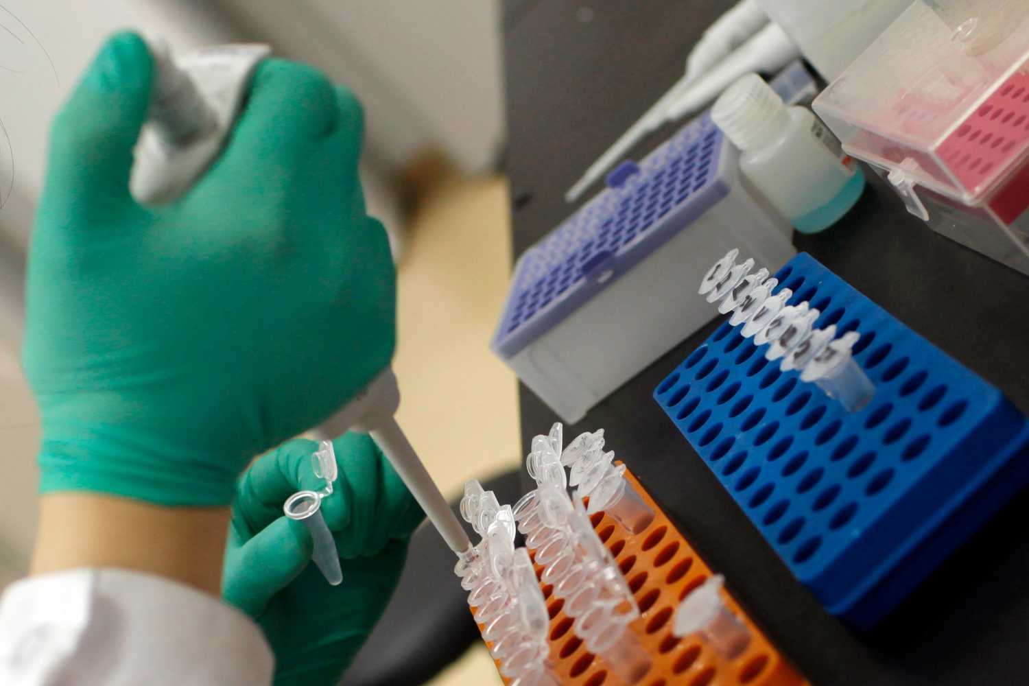 A researcher prepares medicine at a laboratory in Nanjing University in Nanjing, Jiangsu province in this April 29, 2011 file photo. China has increased its spending on science at a blistering rate and now publishes the second most scientific papers in the world after the United States. But China's scientific progress is no sure thing. Interviews with Chinese scientists working in the West together with data from the OECD and some of the world's leading science academies suggest restrictive political and cultural attitudes continue to stifle science there. Picture taken April 29, 2011.     To match Insight SCIENCE-CHINA/       REUTERS/Aly Song/Files   (CHINA - Tags: HEALTH SOCIETY SCIENCE TECHNOLOGY BUSINESS) - GM1E85S1A9G01