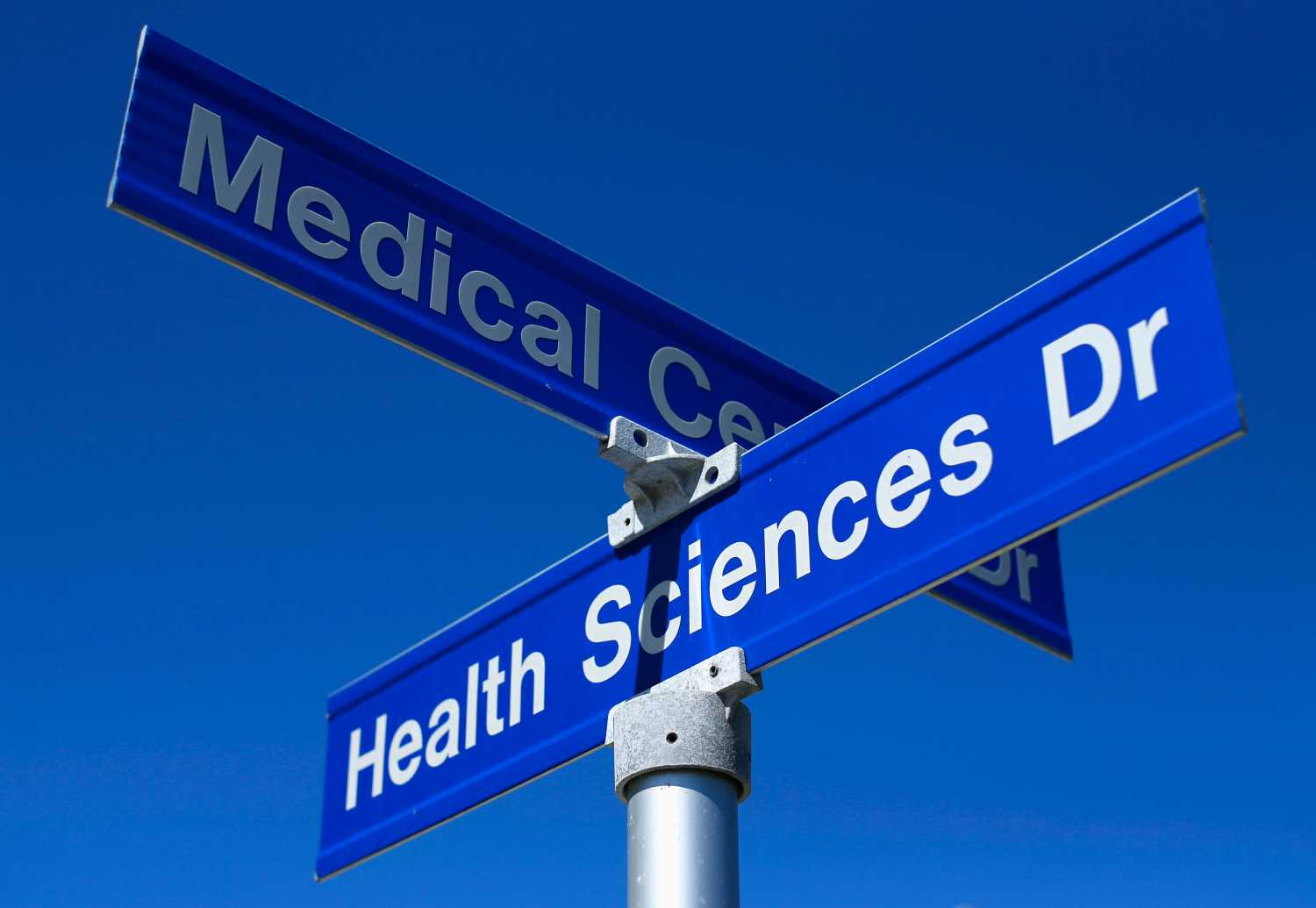 Street signs are pictured at the University of California San Diego (UCSD) in San Diego, California, February 28, 2013. Looming sequestration cuts are expected to adversely effect scientific research in San Diego.  REUTER/Mike Blake  (UNITED STATES - Tags: POLITICS EDUCATION HEALTH SCIENCE TECHNOLOGY) - GM1E9310LEH01