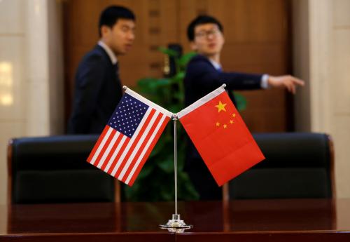 Chinese and U.S. flags are set up for a signing ceremony during a visit by U.S. Secretary of Transportation Elaine Chao at China's Ministry of Transport in Beijing, China April 27, 2018. Picture taken April 27, 2018. REUTERS/Jason Lee - RC13D78E0020