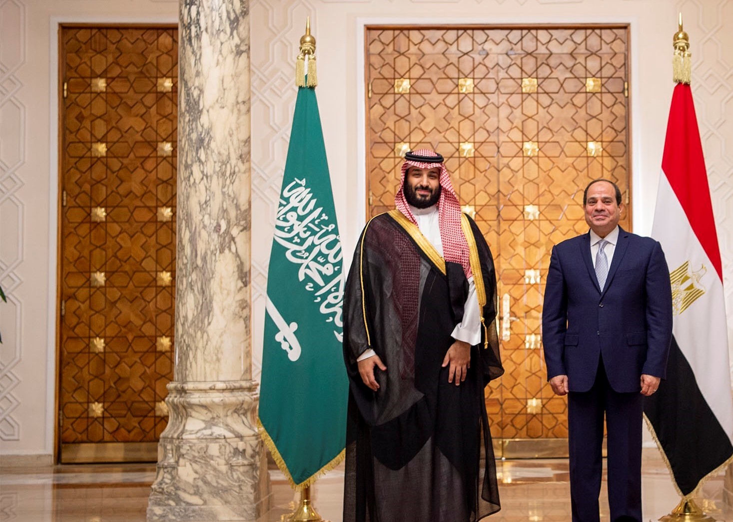 Saudi Arabia's Crown Prince Mohammed bin Salman stands next to Egyptian President Abdel Fattah al-Sisi at the Presidential Palace in Cairo, Egypt November 27, 2018. Bandar Algaloud/Courtesy of Saudi Royal Court/Handout via REUTERS  ATTENTION EDITORS - THIS PICTURE WAS PROVIDED BY A THIRD PARTY? - RC171E79B100