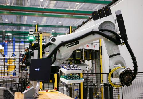 An Electroimpact automated fiber placement machine, which lays down carbon fiber strips onto the 777X spar, is seen during a media tour of the Boeing 777X at the Boeing Composite Wing Center in Everett, Washington, U.S., February 27, 2019. Picture taken February 27, 2019.  REUTERS/Lindsey Wasson - RC1220B68860