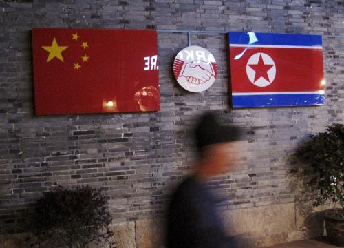 Flags of China and North Korea are seen outside the closed Ryugyong Korean Restaurant in Ningbo, Zhejiang province, China, in this April 12, 2016 file photo. REUTERS/Joseph Campbell/Files      TPX IMAGES OF THE DAY      - GF10000381375