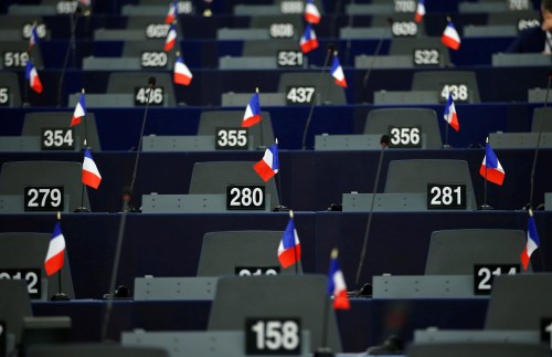 French flags are seen on the desks of Members of the Rassemblement National (RN) far-right party ahead of a debate at the European Parliament in Strasbourg, France, September 17, 2019. REUTERS/Vincent Kessler - RC134C0960B0