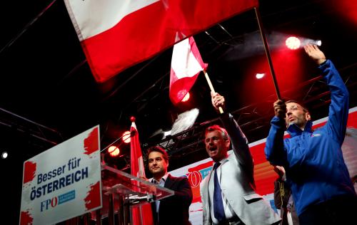 Vice Mayor of Vienna Dominik Nepp, Head of Austria's Freedom Party Norbert Hofer and Former Interior Minister Herbert Kickl hold Austrian flags during the final election rally in Vienna, Austria, September 27, 2019. REUTERS/Lisi Niesner - RC19FDB02500