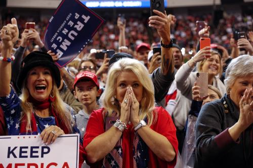Audience members react as U.S. President Donald Trump takes the stage during a campaign rally in Bossier City, LA, U.S., November 14, 2019. Picture taken November 14, 2019. REUTERS/Tom Brenner - RC2IBD9GRWIG