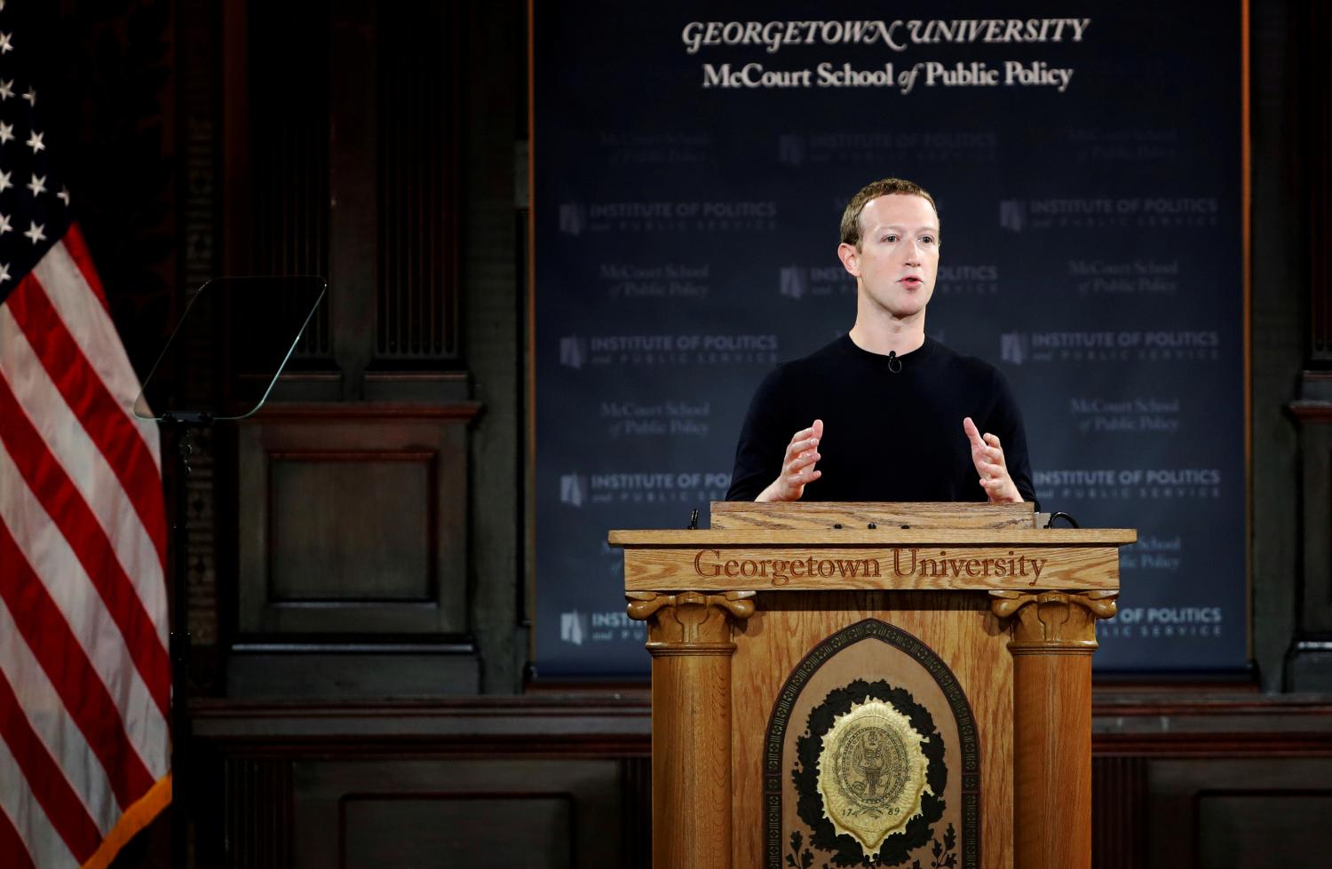 Facebook Chairman and CEO Mark Zuckerberg addresses the audience on "the challenges of protecting free speech while combating hate speech online, fighting misinformation, and political data privacy and security," at a forum hosted by Georgetown University's Institute of Politics and Public Service (GU Politics) and the McCourt School of Public Policy in Washington, U.S., October 17, 2019. REUTERS/Carlos Jasso - RC1CB9578F30