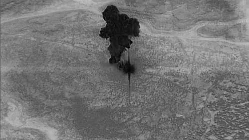 A smoke cloud rises moments after an air strike on the compound of Islamic State leader Abu Bakr al-Baghdadi in the Idlib region of Syria in a still image from video October 26, 2019. Video picture taken October 26, 2019.  U.S. Department of Defense/Handout via REUTERS. THIS IMAGE HAS BEEN SUPPLIED BY A THIRD PARTY. - RC179130A4B0