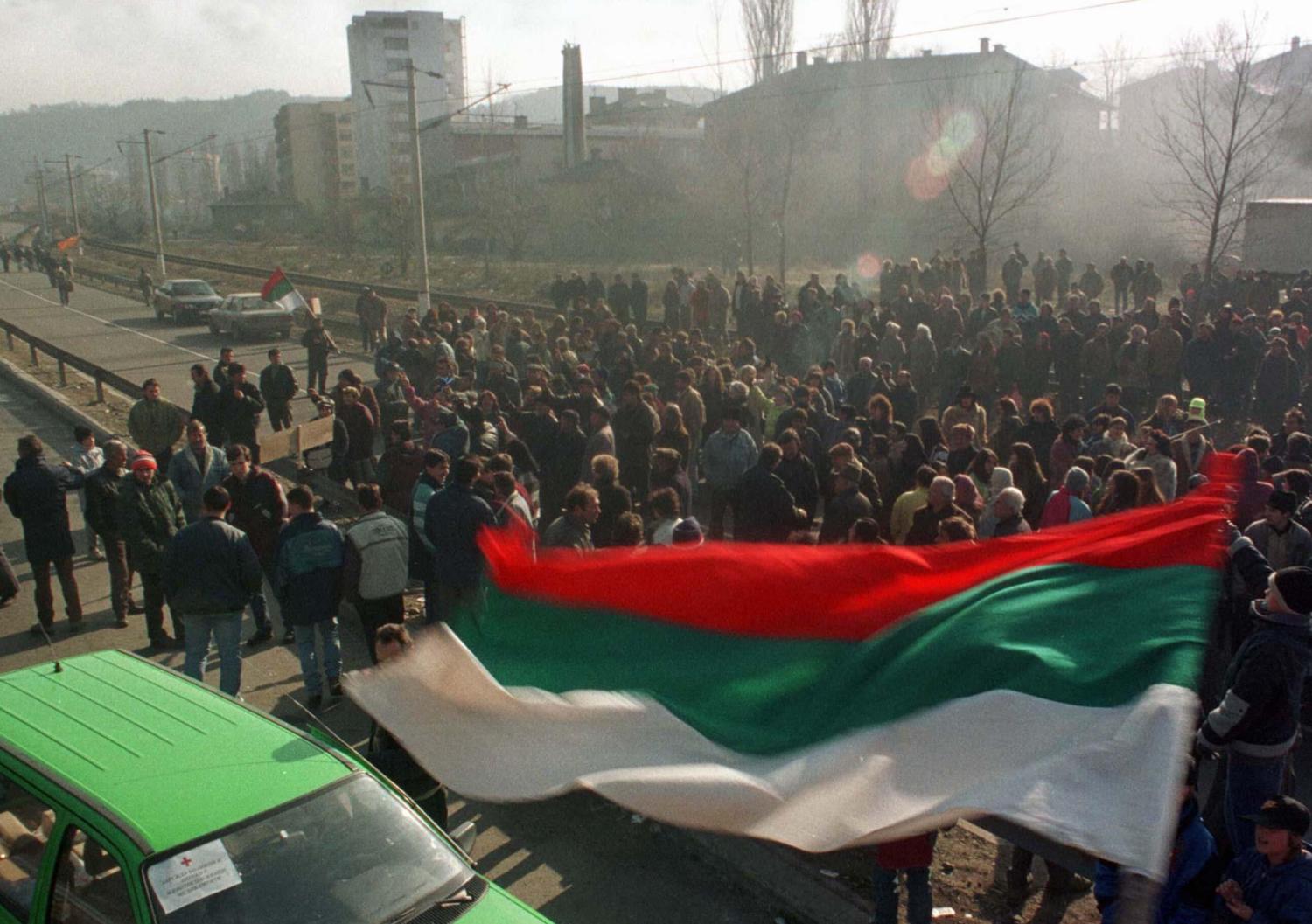 A Bulgarian flag blows in the breeze, as protesters block the main road between Sofia and the Greek border near Doupnitsa, 60 km south of the capital January 30. The angry citizens of Doupnitsa turned out in shifts in freezing cold to blockade road and rail routes to Greece for a second day, in protest against Bulgaria's Socialist rulers.BULGARIA BLOCKADE - RP1DRIDBQHAA