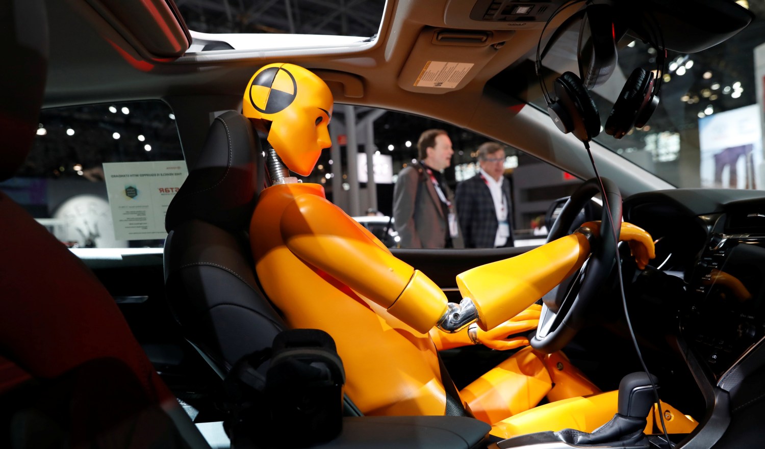 A crash test model is displayed inside a 2018 Toyota Camry on the floor of the New York Auto Show in the Manhattan borough of New York City, New York, U.S., March 29, 2018. REUTERS/Shannon Stapleton     TPX IMAGES OF THE DAY - RC1C93154D10